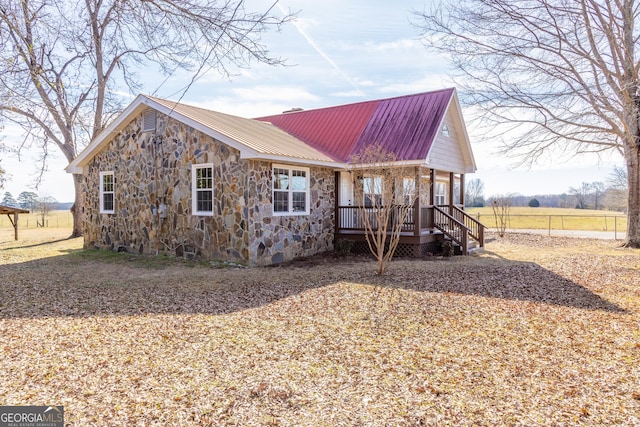 exterior space with a rural view