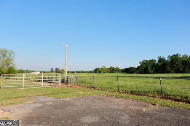 243 College St, Yatesville, GA 31097 - view of yard with a rural view and fence