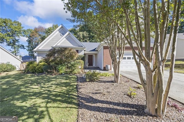 view of front of property with a garage and a front yard