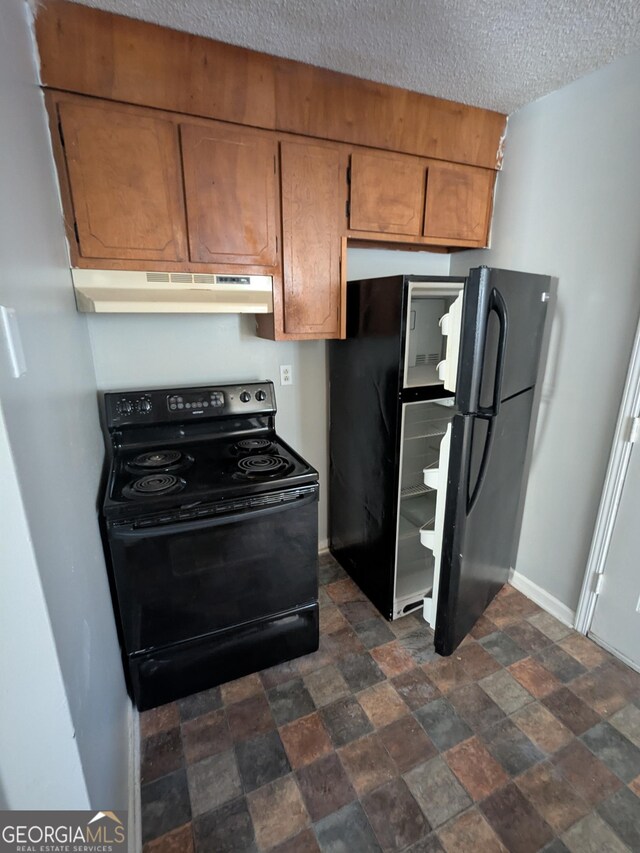 kitchen with a textured ceiling and black appliances