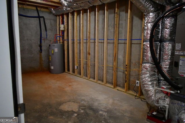 basement with electric water heater and heating unit