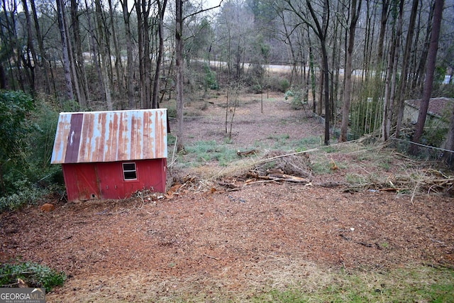 view of yard with a shed