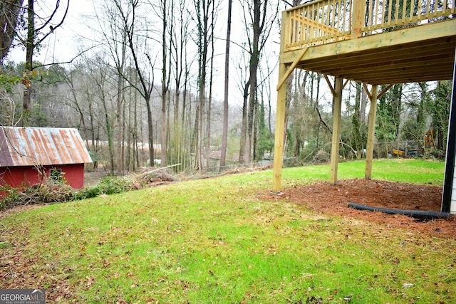 view of yard with a deck