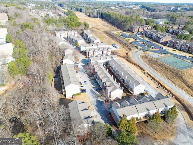 birds eye view of property with a residential view