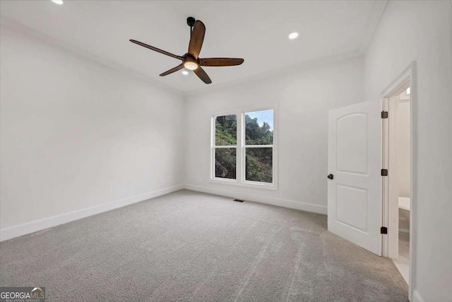 carpeted empty room with ceiling fan