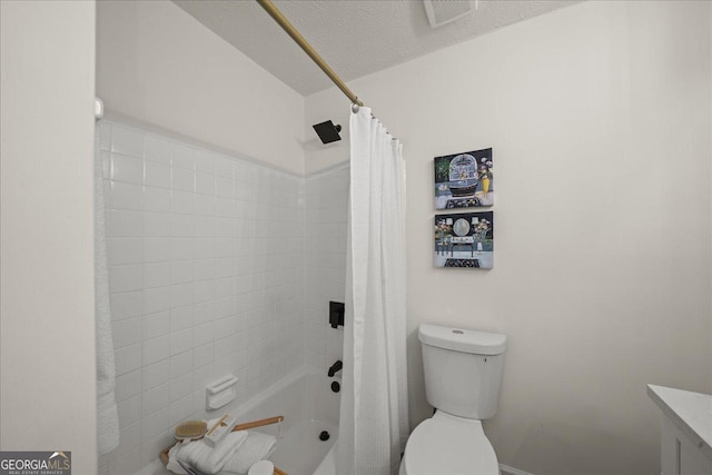 3308 Wildwood Dr SW, Marietta, GA 30060 - full bath with a textured ceiling, shower / tub combo with curtain, visible vents, and toilet