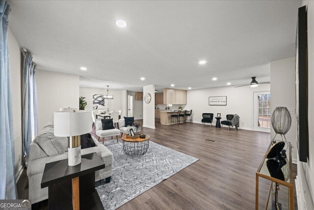 3308 Wildwood Dr SW, Marietta, GA 30060 - living room featuring recessed lighting, baseboards, and dark wood finished floors