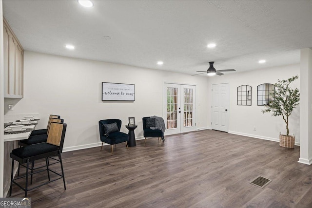 3308 Wildwood Dr SW, Marietta, GA 30060 - living area with baseboards, visible vents, french doors, and dark wood-style flooring