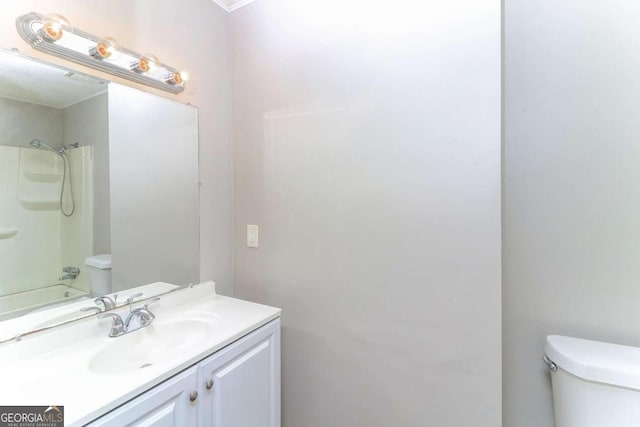 full bathroom with vanity, toilet, and  shower combination