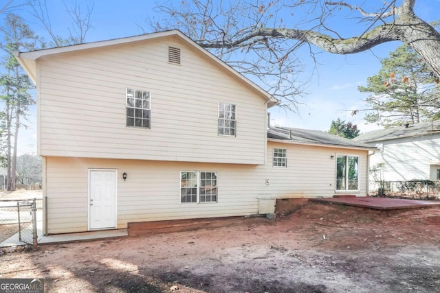 back of house featuring a patio area