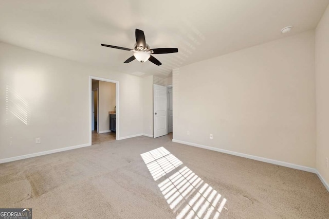 unfurnished bedroom with light carpet and ceiling fan