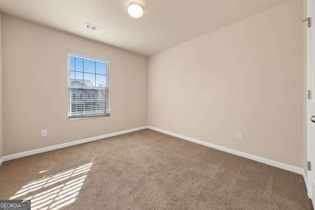 view of carpeted spare room