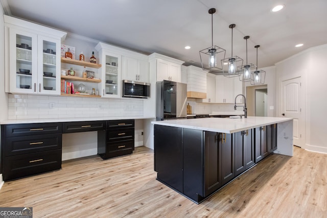 3166 Old Good Hope Rd, Good Hope, GA 30641 - kitchen featuring stainless steel microwave, white cabinets, light countertops, recessed lighting, and ornamental molding