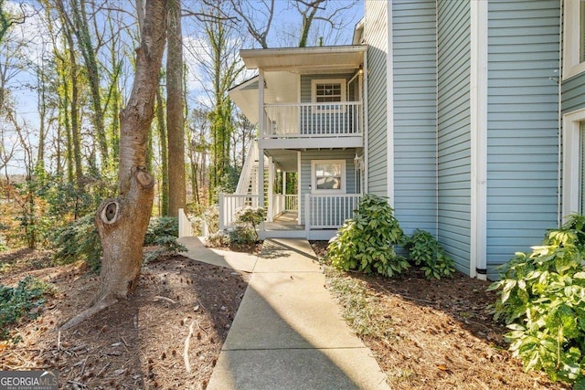 property entrance with a balcony