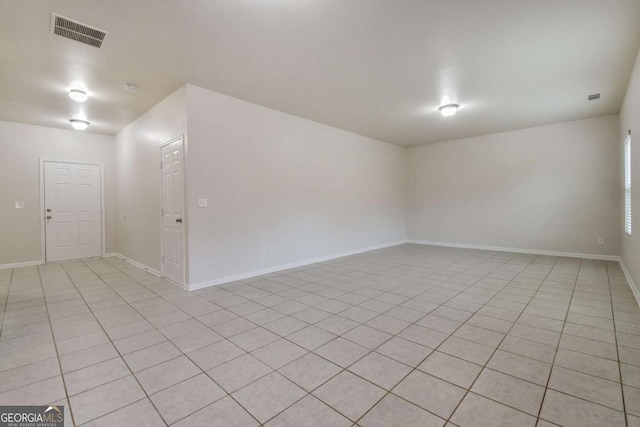 empty room featuring light tile patterned flooring