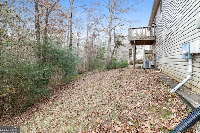 view of yard with central AC unit