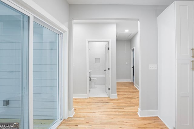 hallway featuring light wood-type flooring