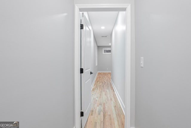 hall featuring light hardwood / wood-style flooring