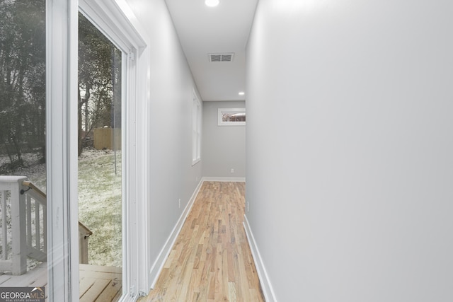 hall featuring light hardwood / wood-style floors