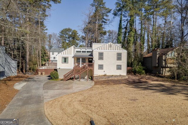 view of yard with a wooden deck