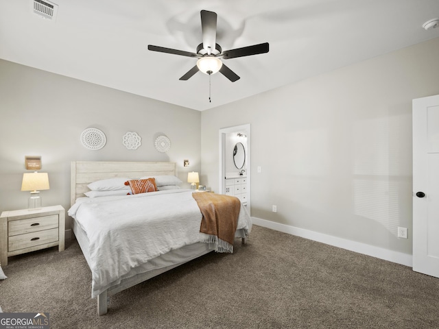 bedroom with ceiling fan and dark carpet