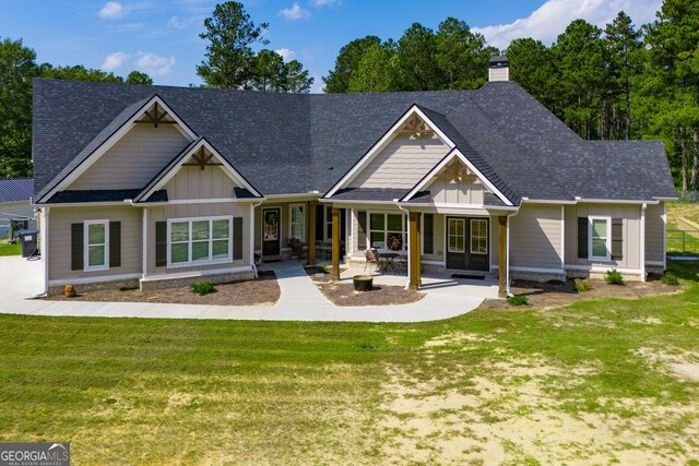 1291 Pleasant Grove Church Rd, Villa Rica, GA 30180 - back of property featuring a yard and a patio area