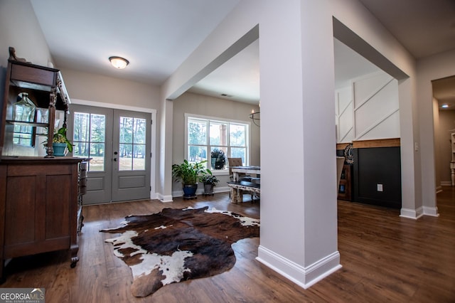 1291 Pleasant Grove Church Rd, Villa Rica, GA 30180 - entryway with dark hardwood / wood-style floors, an inviting chandelier, and french doors