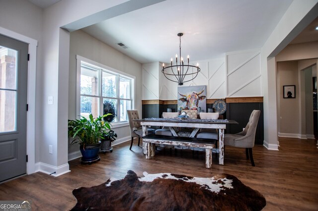 1291 Pleasant Grove Church Rd, Villa Rica, GA 30180 - dining area featuring an inviting chandelier and dark hardwood / wood-style flooring