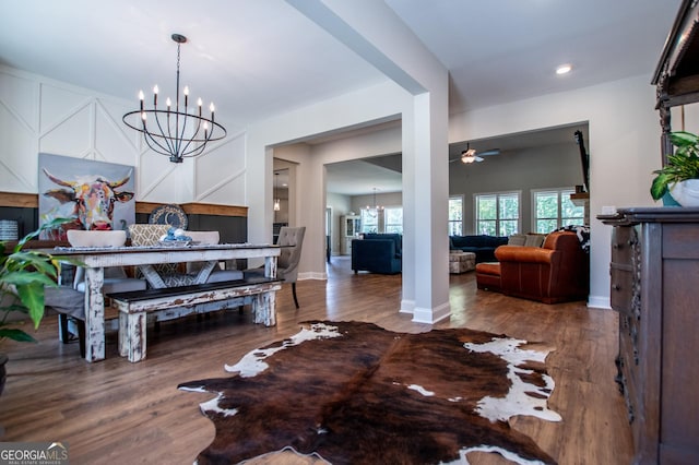 1291 Pleasant Grove Church Rd, Villa Rica, GA 30180 - dining space featuring ceiling fan with notable chandelier and hardwood / wood-style floors