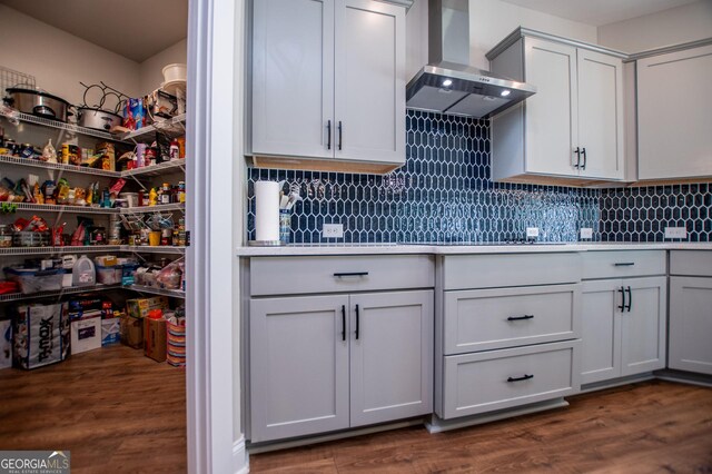 1291 Pleasant Grove Church Rd, Villa Rica, GA 30180 - interior space with tasteful backsplash, black electric stovetop, dark hardwood / wood-style floors, and wall chimney exhaust hood