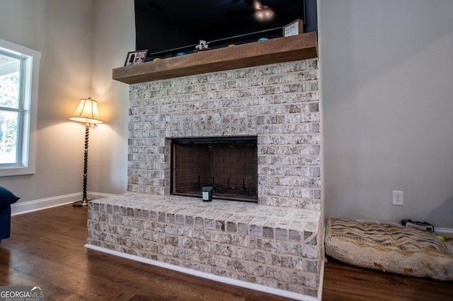 1291 Pleasant Grove Church Rd, Villa Rica, GA 30180 - interior details featuring wood-type flooring and a brick fireplace