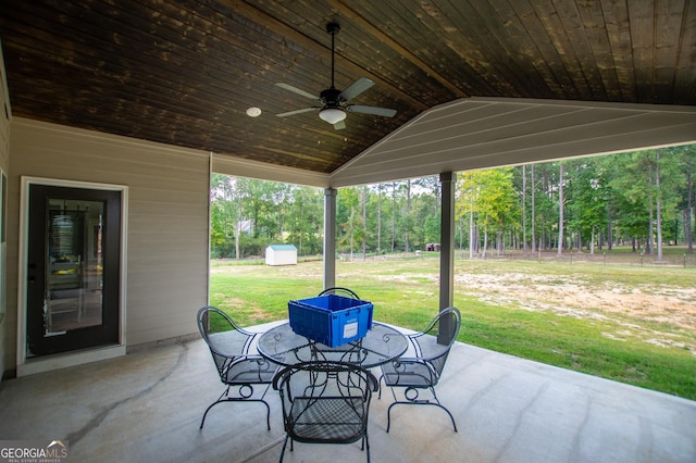 1291 Pleasant Grove Church Rd, Villa Rica, GA 30180 - view of patio / terrace with ceiling fan and a storage unit