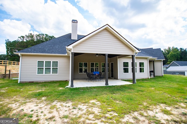 1291 Pleasant Grove Church Rd, Villa Rica, GA 30180 - rear view of house featuring a patio, a yard, and ceiling fan