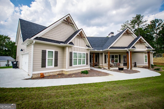 1291 Pleasant Grove Church Rd, Villa Rica, GA 30180 - craftsman-style house featuring a garage, a porch, and a front lawn