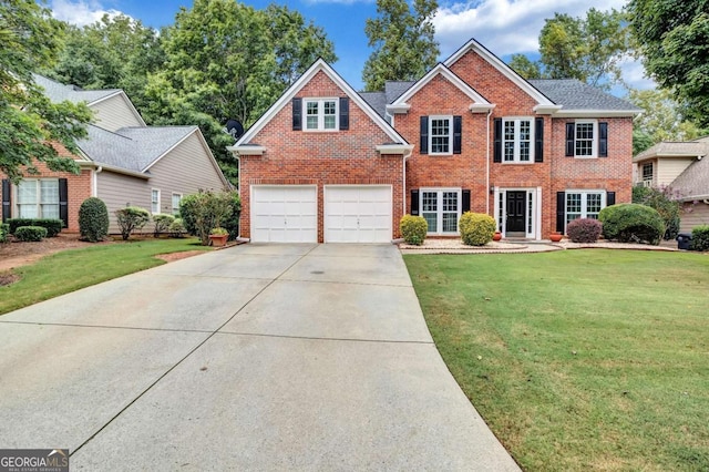 view of front facade featuring a garage and a front yard