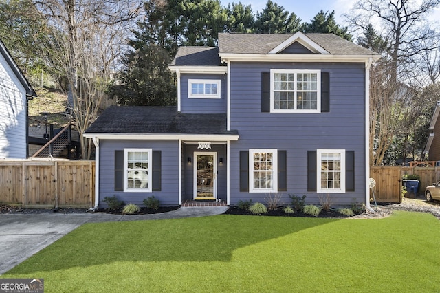 view of front facade featuring a front yard