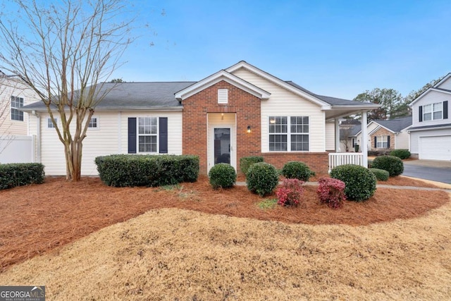 ranch-style home with a porch