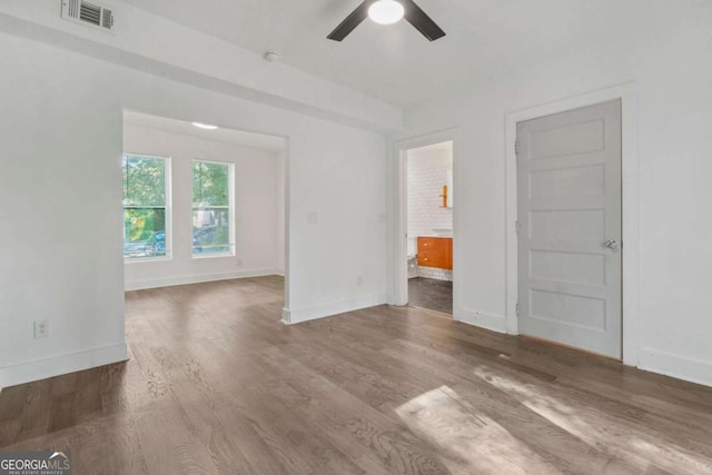 unfurnished room featuring wood-type flooring and ceiling fan