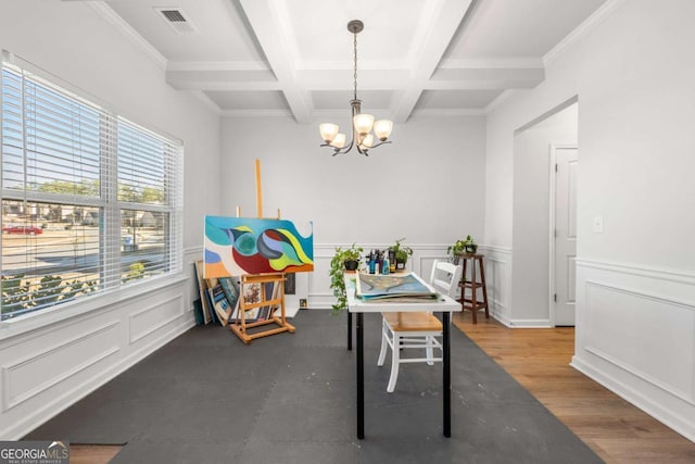 dining area with coffered ceiling, wood-type flooring, a chandelier, and beamed ceiling