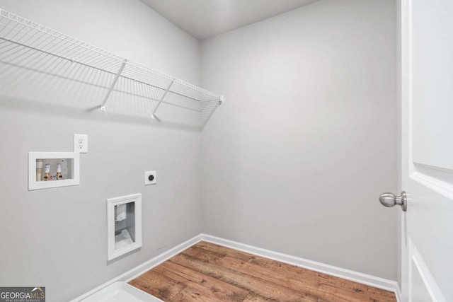 laundry room with washer hookup, hardwood / wood-style flooring, and hookup for an electric dryer