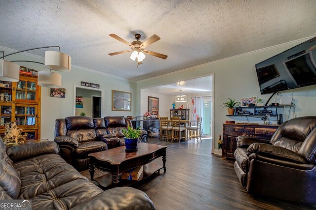 living area with crown molding, a textured ceiling, a ceiling fan, and dark wood-type flooring