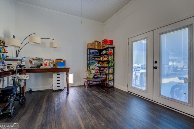 office space with french doors, crown molding, baseboards, and wood finished floors