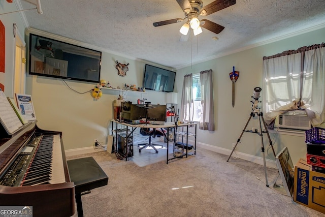 office space featuring ceiling fan, ornamental molding, light carpet, and a textured ceiling