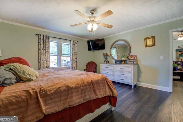 bedroom featuring dark wood-type flooring, ornamental molding, a textured ceiling, and baseboards