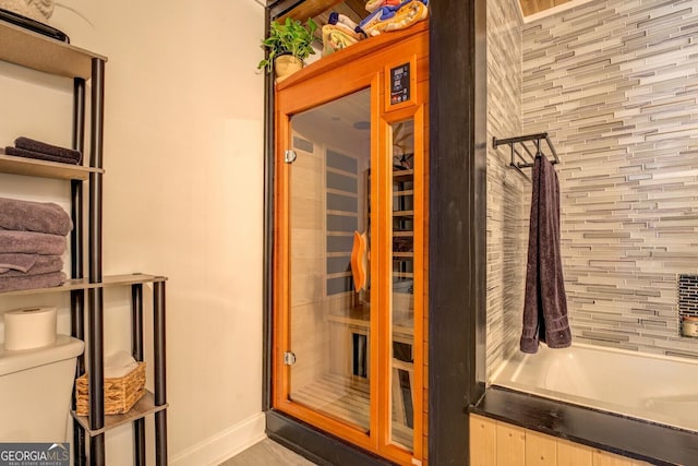 view of sauna / steam room with baseboards