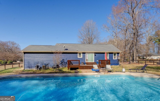 view of pool featuring a wooden deck