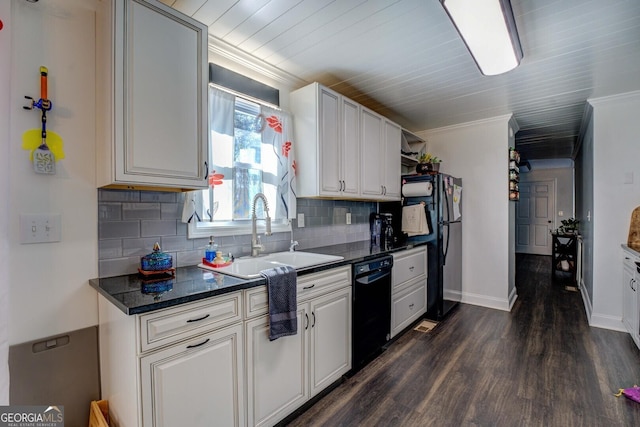 kitchen featuring sink, white cabinets, dark hardwood / wood-style flooring, black appliances, and crown molding