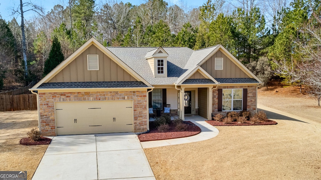 craftsman-style home with a garage