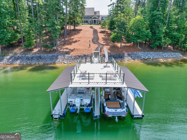 view of dock with a water view