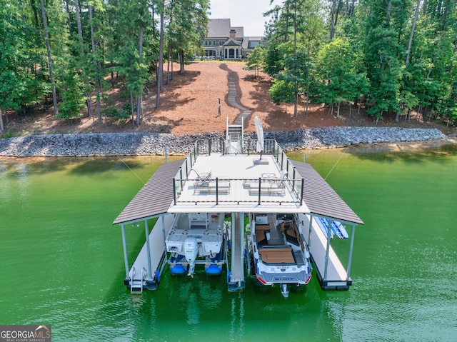 dock area featuring a water view and boat lift